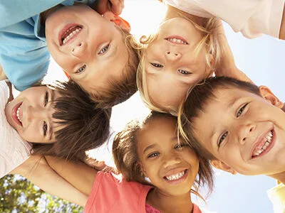 A circle of smiling children